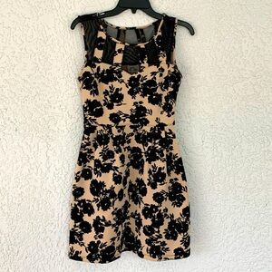 Sweet Storm dress with lacy details on the top